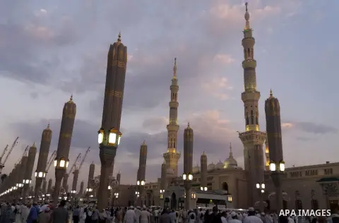 Muslims pilgrims visit the tomb of Prophet Mohammad at Al-Masjid al-Nabawi (The Mosque of the Prophet) after their duty of pilgrimage in the holy city of Medina, Saudi Arabia Sept. 11, 2017. Photo by Mohammed Hassan