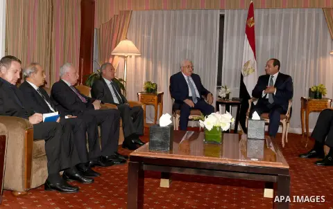 Palestinian President Mahmoud Abbas meets with Egyptian President Abdel Fattah al-Sisi, in New York City, U.S. September 18, 2017. Photo by Osama Falah