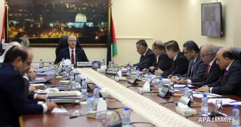 Palestinian Prime Minister, Rami hamdallah, chairs the Palestinian council meeting in the West Bank city of Ramallah on September 19, 2017. Photo by Prime Minister Office