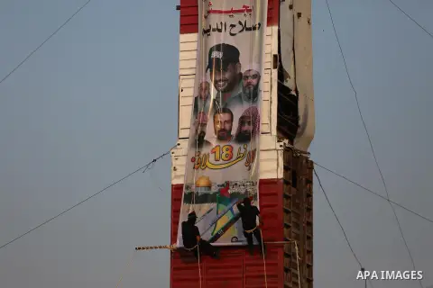 Palestinian militants of al-Nasser Salah al-Deen Brigades, the military wing of the Popular Resistance Committees, take part in a training exercise in Khan Younis in the southern Gaza Strip on September 19, 2017. Photo b...