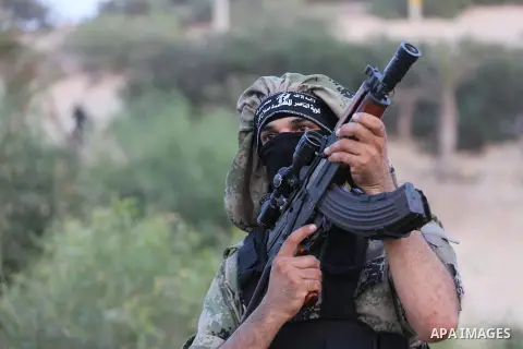 Palestinian militants of al-Nasser Salah al-Deen Brigades, the military wing of the Popular Resistance Committees, take part in a training exercise in Khan Younis in the southern Gaza Strip on September 19, 2017. Photo b...
