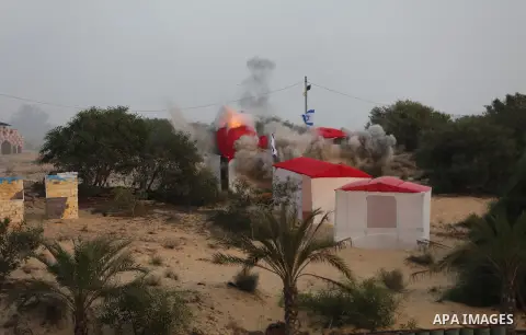Palestinian militants of al-Nasser Salah al-Deen Brigades, the military wing of the Popular Resistance Committees, take part in a training exercise in Khan Younis in the southern Gaza Strip on September 19, 2017. Photo b...