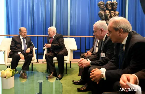 Palestinian President Mahmoud Abbas meets with Lebanese President Michel Aoun in New York City, U.S. on September 19, 2017. Photo by Osama Falah