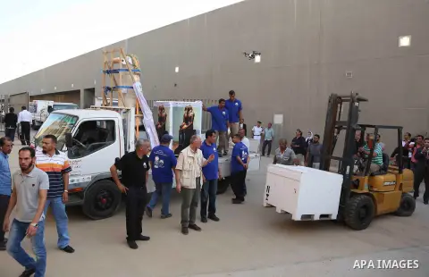 Egyptian workers transport statues upon its arrival at the restoration laboratory of the Grand Egyptian Museum (GEM) in Cairo, Egypt, on Sept. 20, 2017. A batch of statues were transported from the Egyptian Museum to the...