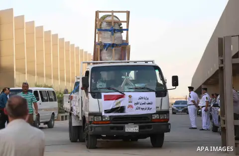 Egyptian workers transport statues upon its arrival at the restoration laboratory of the Grand Egyptian Museum (GEM) in Cairo, Egypt, on Sept. 20, 2017. A batch of statues were transported from the Egyptian Museum to the...