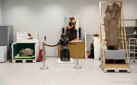 Egyptian workers transport statues upon its arrival at the restoration laboratory of the Grand Egyptian Museum (GEM) in Cairo, Egypt, on Sept. 20, 2017. A batch of statues were transported from the Egyptian Museum to the...