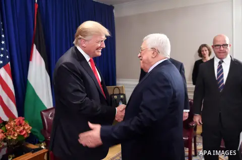 Palestinian President Mahmoud Abbas meets with US President Donald Trump in New York City, U.S. on September 19, 2017. Photo by Thaer Ghanaim