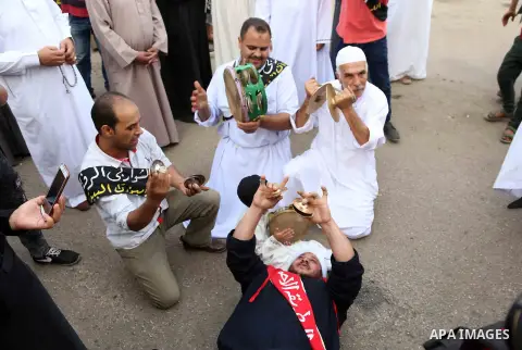Egyptian Sufi Muslims practice ritualized Zikr (invocation) to celebrate the New Islamic Hijri year 1439 in front of al-Hussein mosque at Al-Azhar district in old Islamic Cairo, Egypt, on September 22, 2017. Photo by Amr...