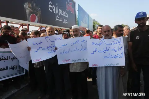 Palestinians of the Union of Agricultural Work Committees take part in a support of the Palestinian reconciliation, in Gaza city, on September 24, 2017. Palestinian President Mahmoud Abbas on Saturday said an announcemen...