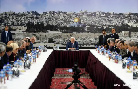 Palestinian President Mahmoud Abbas chairs a meeting of the Palestinian leadership in the West Bank city of Ramallah on September 25, 2017 Palestinian prime minister Rami Hamdallah will travel to Gaza on October 2 as par...