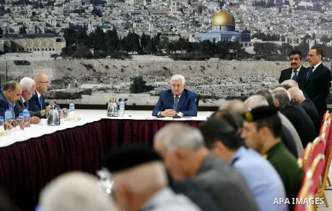 Palestinian President Mahmoud Abbas chairs a meeting of the Palestinian leadership in the West Bank city of Ramallah on September 25, 2017 Palestinian prime minister Rami Hamdallah will travel to Gaza on October 2 as par...