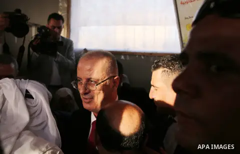 Palestinian Prime Minister Rami Hamdallah visits a house of Palestinian family at Shejaiya neighborhood in Gaza City on October 2, 2017. Palestinian prime minister Rami Hamdallah arrived in Gaza for his first visit in tw...