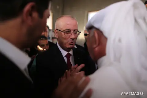 Palestinian Prime Minister Rami Hamdallah visits a house of Palestinian family at Shejaiya neighborhood in Gaza City on October 2, 2017. Palestinian prime minister Rami Hamdallah arrived in Gaza for his first visit in tw...