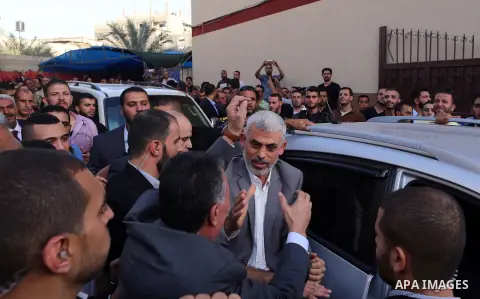 Hamas's leader in the Gaza Strip Yahya Sinwar waves as he arrives for a meeting with Palestinian prime minister and other officials in Gaza City October 2, 2017. Palestinian prime minister Rami Hamdallah arrived in Gaza...