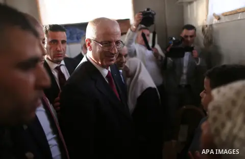 Palestinian Prime Minister Rami Hamdallah visits a house of Palestinian family at Shejaiya neighborhood in Gaza City on October 2, 2017. Palestinian prime minister Rami Hamdallah arrived in Gaza for his first visit in tw...