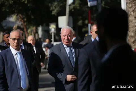 Palestinian Foreign Minister Riad al-Maliki and Palestinian Minister of Transport and Communications Samih Tabila arrive before a reconciliation cabinet meeting in Gaza City on October 3, 2017. The Palestinian reconcilia...