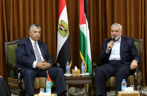 Palestinian Hamas Chief Ismail Haniyeh meets with Egyptian Intelligence Minister Khalid Fawzi at his office in Gaza City on October 3, 2017. Photo by Mohammed Asad