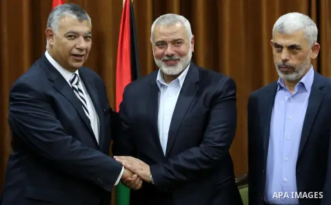 Palestinian Hamas Chief Ismail Haniyeh meets with Egyptian Intelligence Minister Khalid Fawzi at his office in Gaza City on October 3, 2017. Photo by Mohammed Asad