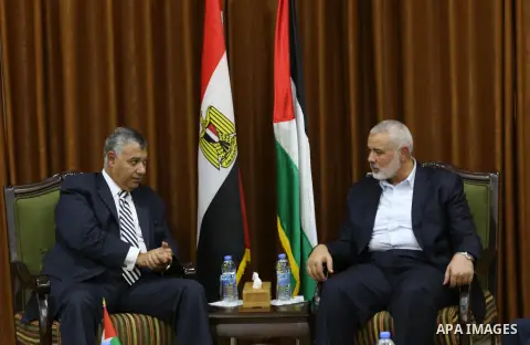 Palestinian Hamas Chief Ismail Haniyeh meets with Egyptian Intelligence Minister Khalid Fawzi at his office in Gaza City on October 3, 2017. Photo by Mohammed Asad