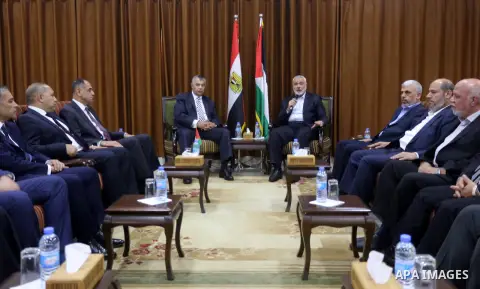 Palestinian Hamas Chief Ismail Haniyeh meets with Egyptian Intelligence Minister Khalid Fawzi at his office in Gaza City on October 3, 2017. Photo by Mohammed Asad