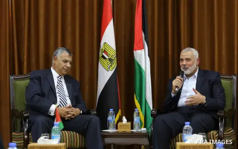 Palestinian Hamas Chief Ismail Haniyeh meets with Egyptian Intelligence Minister Khalid Fawzi at his office in Gaza City on October 3, 2017. Photo by Mohammed Asad
