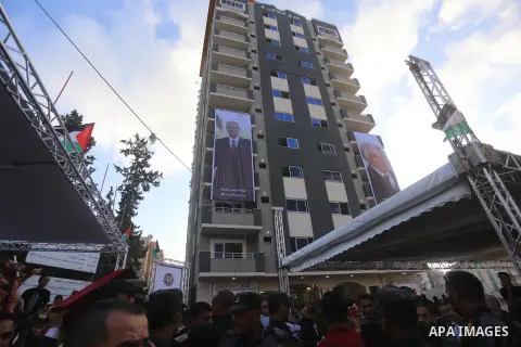 Palestinian Prime Minister Rami Hamdallah attends the opening ceremony of al-Zafer building, which was destroyed during the recent Israeli war on Gaza Strip, in Gaza city on October 3, 2017. Photo by Yasser Qudih