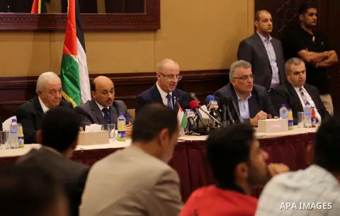 Palestinian Prime Minister Rami Hamdallah meets with Palestinian youths in Gaza city on October 4, 2017. For three days it was all smiles as the Palestinian prime minister held talks in Gaza with Hamas but as the symboli...