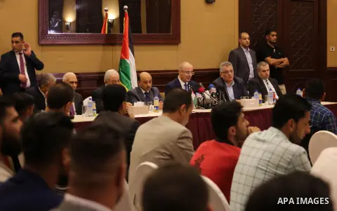 Palestinian Prime Minister Rami Hamdallah meets with Palestinian youths in Gaza city on October 4, 2017. For three days it was all smiles as the Palestinian prime minister held talks in Gaza with Hamas but as the symboli...