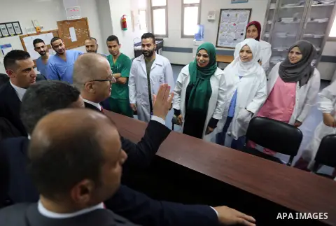 Palestinian Prime Minister Rami Hamdallah visits Al-Shifa hospital in Gaza City October 5, 2017.For three days it was all smiles as the Palestinian prime minister held talks in Gaza with Hamas but as the symbolic visit d...