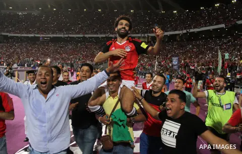 Egypt's Mohamed Salah celebrates after winning the 2018 FIFA World Cup qualification match between Egypt and Congo at the Borg El-Arab Stadium in Alexandria, Egypt, Oct. 8, 2017. Egypt won 2-1 and qualified to the World...
