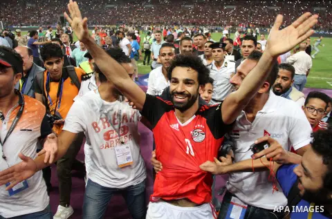 Egypt's Mohamed Salah celebrates after winning the 2018 FIFA World Cup qualification match between Egypt and Congo at the Borg El-Arab Stadium in Alexandria, Egypt, Oct. 8, 2017. Egypt won 2-1 and qualified to the World...