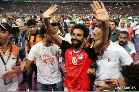 Egypt's Mohamed Salah celebrates after winning the 2018 FIFA World Cup qualification match between Egypt and Congo at the Borg El-Arab Stadium in Alexandria, Egypt, Oct. 8, 2017. Egypt won 2-1 and qualified to the World...