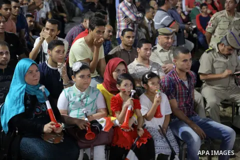 Supporters of Egypt celebrate after the 2018 FIFA World Cup qualification match between Egypt and Congo, in Cairo, Egypt, Oct. 8, 2017. Egypt won 2-1 and qualified to the World Cup finals. Photo by Stringer