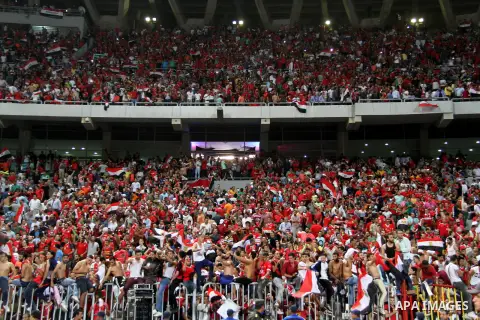 Supporters of Egypt celebrate after the 2018 FIFA World Cup qualification match between Egypt and Congo at the Borg El-Arab Stadium in Alexandria, Egypt, Oct. 8, 2017. Egypt won 2-1 and qualified to the World Cup finals....