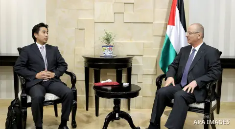 Palestinian Prime Minister, Rami Hamdallah, meets with Japanese Ambassador to Palestine Takeshi Okubo, in the West Bank city of Ramallah, on October 11, 2017. Photo by Prime Minister Office