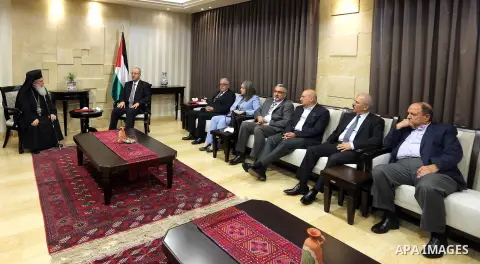 Palestinian Prime Minister, Rami Hamdallah meets with a delegation from the Roman Orthodox Patriarch, in the West Bank city of Ramallah, on October 17, 2017. Photo by Prime Minister Office