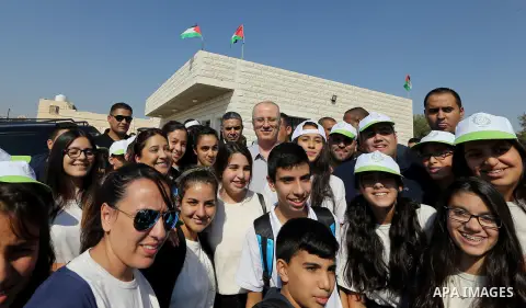 Palestinian Prime Minister Rami Hamdallah takes part in the 17th annual olive picking festival in Tekoa village near the West Bank city of Bethlehem, on October 25, 2017. Photo by Prime Minister Office
