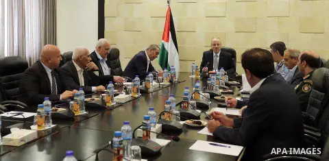 Palestinian Prime Minister Rami Hamdallah meets with security chiefs at his office in the West Bank city of Ramallah on October 26, 2017. Photo by Prime Minister Office
