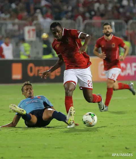 Egypt's Al-Ahly and Wydad Casablanca players compete during the CAF Champions League final football match between Al-Ahly vs Wydad Casablanca at the Borg El Arab Stadium in Alexandria on October 28, 2017. Photo by String...