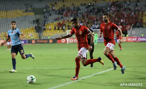 Egypt's Al-Ahly and Wydad Casablanca players compete during the CAF Champions League final football match between Al-Ahly vs Wydad Casablanca at the Borg El Arab Stadium in Alexandria on October 28, 2017. Photo by String...