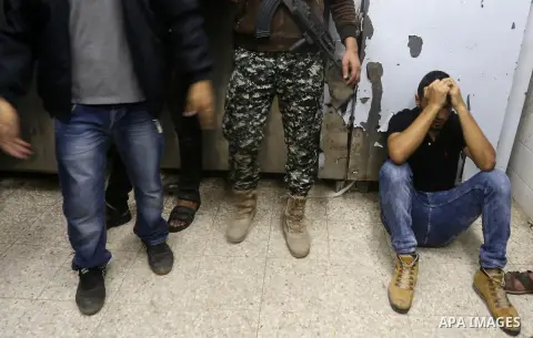 A Palestinian man reacts after his relative was killed after Israel blew up what it said was a tunnel stretching from the Gaza Strip into its territory, at a morgue at al-Aqsa hospital in Deir el-Balah, in central Gaza,...
