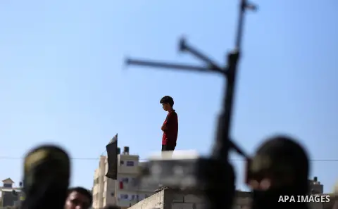Palestinian Islamic Jihad militants attend the funeral of comrades killed in an Israeli operation to blow up a tunnel stretching from the Gaza Strip into Israel at the Bureij refugee camp, in central Gaza, on October 31,...