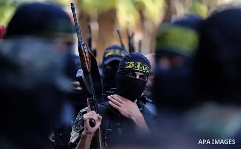 Palestinian Islamic Jihad militants attend the funeral of comrades killed in an Israeli operation to blow up a tunnel stretching from the Gaza Strip into Israel at the Bureij refugee camp, in central Gaza, on October 31,...