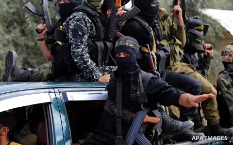 Palestinian Islamic Jihad militants attend the funeral of comrades killed in an Israeli operation to blow up a tunnel stretching from the Gaza Strip into Israel at the Bureij refugee camp, in central Gaza, on October 31,...