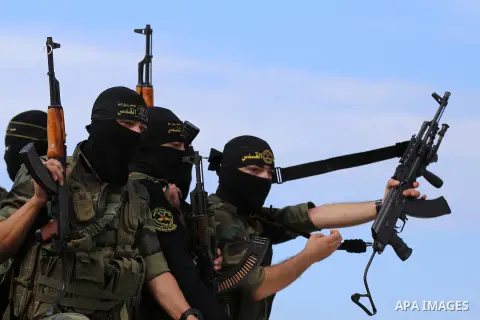 Palestinian Islamic Jihad militants attend the funeral of comrades killed in an Israeli operation to blow up a tunnel stretching from the Gaza Strip into Israel at the Bureij refugee camp, in central Gaza, on October 31,...