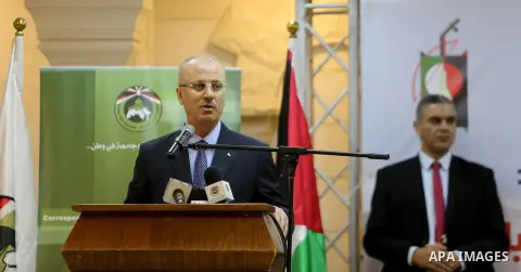 Palestinian Prime Minister, Rami Hamdallah, speaks during the 6th Conference on Popular Heritage in the West Bank city of Jenin, on November 8, 2017. Photo by Prime Minister Office