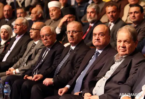 Palestinian Prime Minister Rami Hamdallah attends the ceremony marking the 13th anniversary of the death of late Palestinian leader Yasser Arafat, in the West Bank city of Ramallah on November 10, 2017. Photo by Prime Mi...