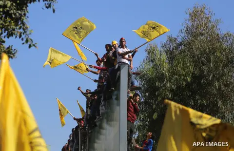 Palestinian Fatah supporters take part in a rally to mark the 13th anniversary of the death of late Palestinian leader Yasser Arafat in Gaza City on November 11, 2017. Photo by Mohammed Dahman
