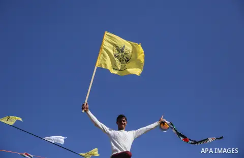 Palestinian Fatah supporters take part in a rally to mark the 13th anniversary of the death of late Palestinian leader Yasser Arafat in Gaza City on November 11, 2017. Photo by Mohammed Dahman