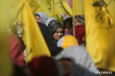 Palestinian Fatah supporters take part in a rally to mark the 13th anniversary of the death of late Palestinian leader Yasser Arafat in Gaza City on November 11, 2017. Photo by Mohammed Dahman